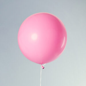 pink balloon on string